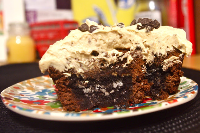 Parent Trap Brownies are stuffed with peanut butter and Oreos and covered in peanut butter frosting | www.thebatterthickens.com