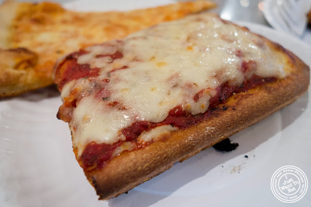 image of Sicilian slice at Famous Ben's pizza in Soho, NYC, New York