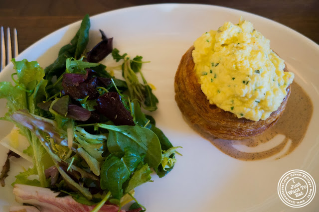 image of soft scrambled eggs vol-au-vent with chèvre and leeks at Lafayette in Greenwich Village, NYC, New York