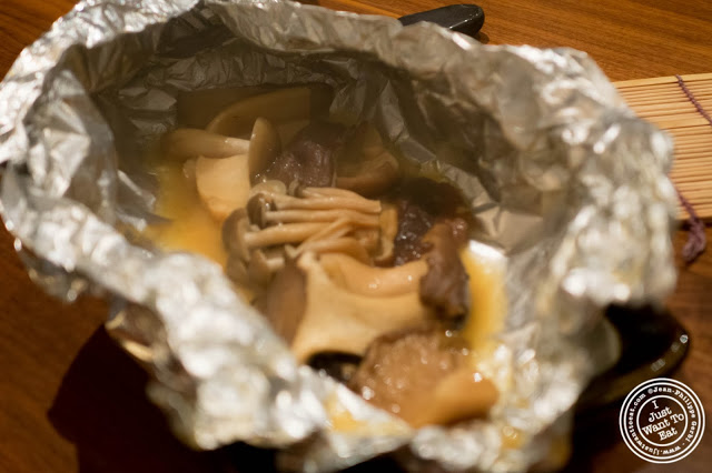 image of grilled mushrooms in foil at Inakaya in Times Square, NYC, New York