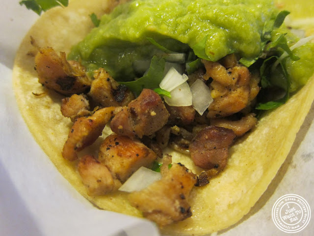 image of pollo assado (charbroiled chicken) taco at Pinche Taqueria in NYC, New York