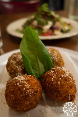 image of red pepper and spinach arancini at Capizzi  in Hell's Kitchen, NYC, New York