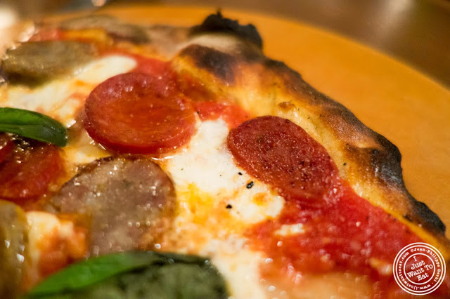 image of pepperoni and sausage pizza at Capizzi  in Hell's Kitchen, NYC, New York