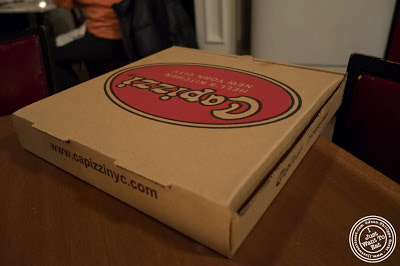 image of  pizza box at Capizzi  in Hell's Kitchen, NYC, New York