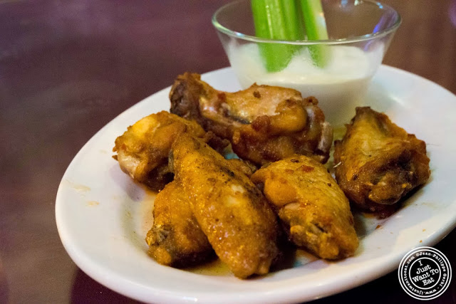 image of chicken wings at John's pizzeria in Times Square, NYC, New York