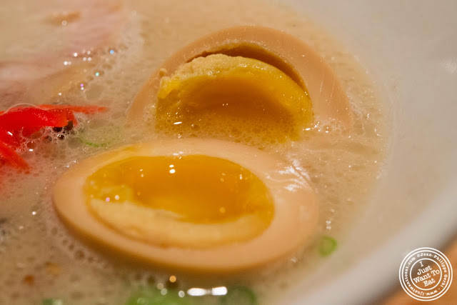 image of soft boiled egg in Shiromaru Hakata Classic at Ippudo West Side in NYC, New York