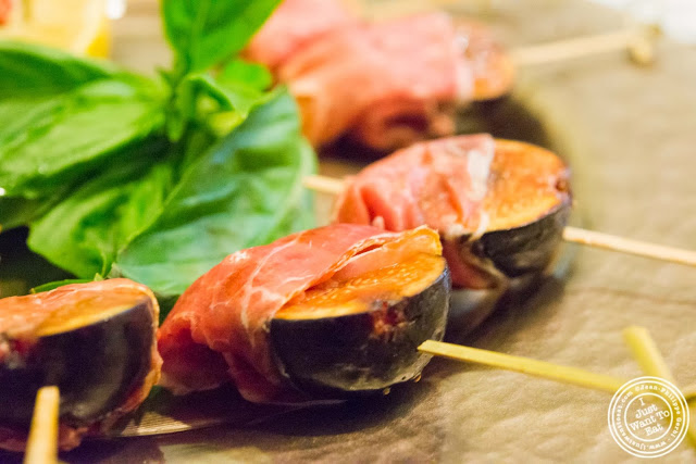 image of prosciutto wrapped figs at Osteria Del Circo in NYC, New York