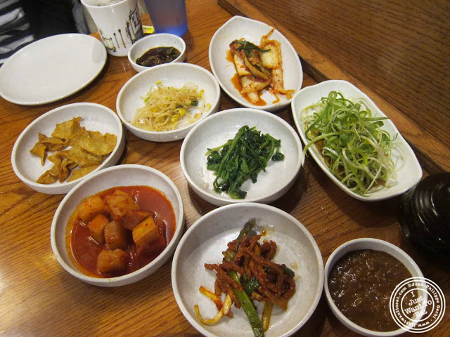 image of banchan at Kunjip Korean restaurant  in NYC, New York