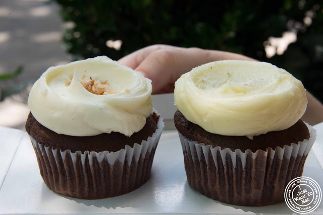 image of chocolate cake with coconut icing and vanilla cake with lemon icing Cupcake at Butter Lane in the East Village, NYC, New York