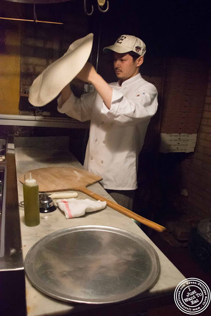 image of pizza making at Luzzo's with Scott's pizza tours in NYC, New York
