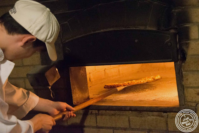 image of oven and pizza making at Luzzo's with Scott's pizza tours in NYC, New York