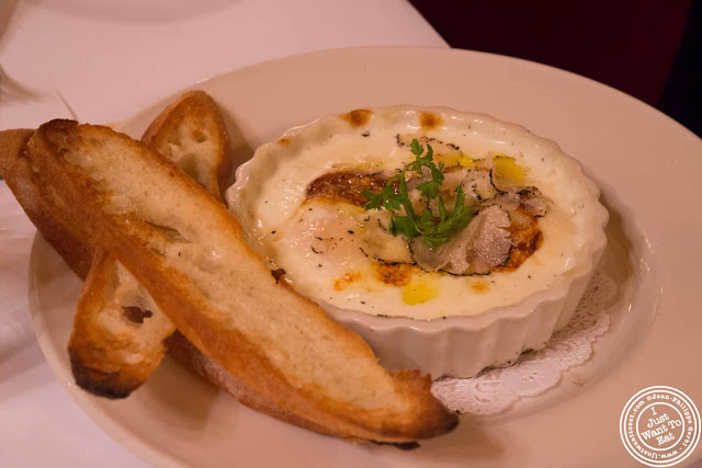 Image of shirred eggs with black trumpet mushrooms at Minetta Tavern in NYC, New York