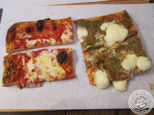 Image of plain pizza and Tricolore (Basil pesto and mozzarella di buffala) at Pizza Roma in NYC, New York