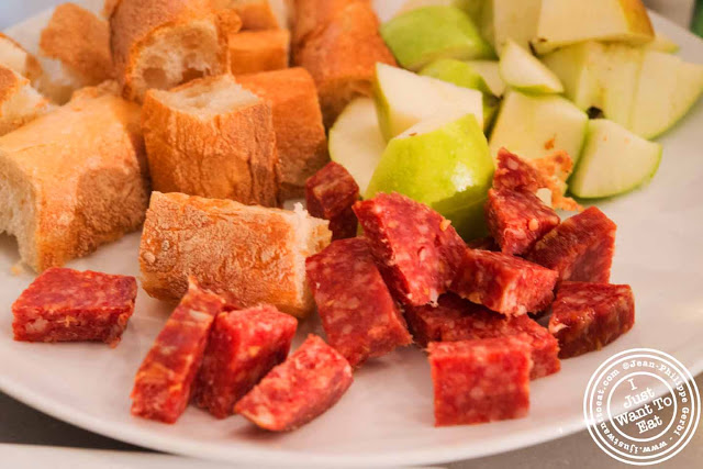Image of Apple, bread and salami at the Vintner Wine Market in NYC, New York - Hell's Kitchen
