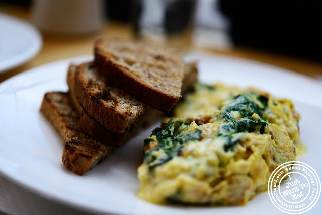 Image of bacon, spinach & fontina scramble with whole wheat toasts at Market Table in NYC, New York