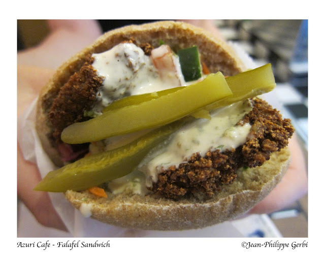 Image of falafel sandwich in pita at Azuri Cafe in Hell's Kitchen NYC, New York